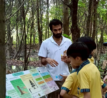 Students exploring the forest